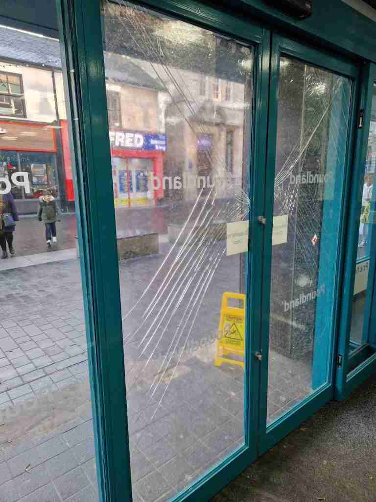 Damaged Shop Door